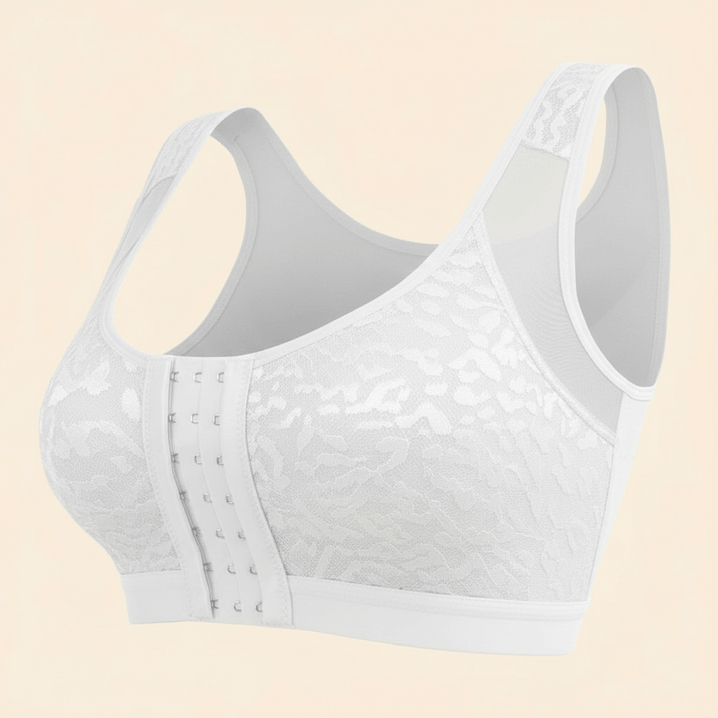 Brassière grand maintien femme blanche avec fermeture à agrafes sur le devant, dentelle florale et bretelles larges, packshot e-commerce sur fond ivoire crème.