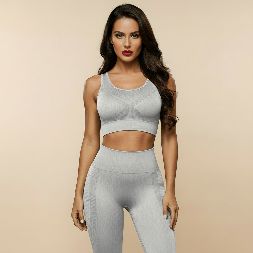  Legging anti cellulite gris clair, vue de face, pose élégante, brassière assortie, studio crème.