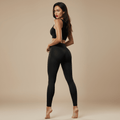 Legging anti cellulite noir femme vue arrière élégante avec effet push up et taille haute