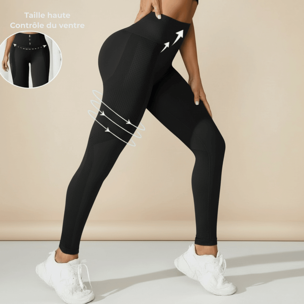 legging anti cellulite photo produit fond crème, legging noir, taille haute contrôle du ventre, flèches blanches