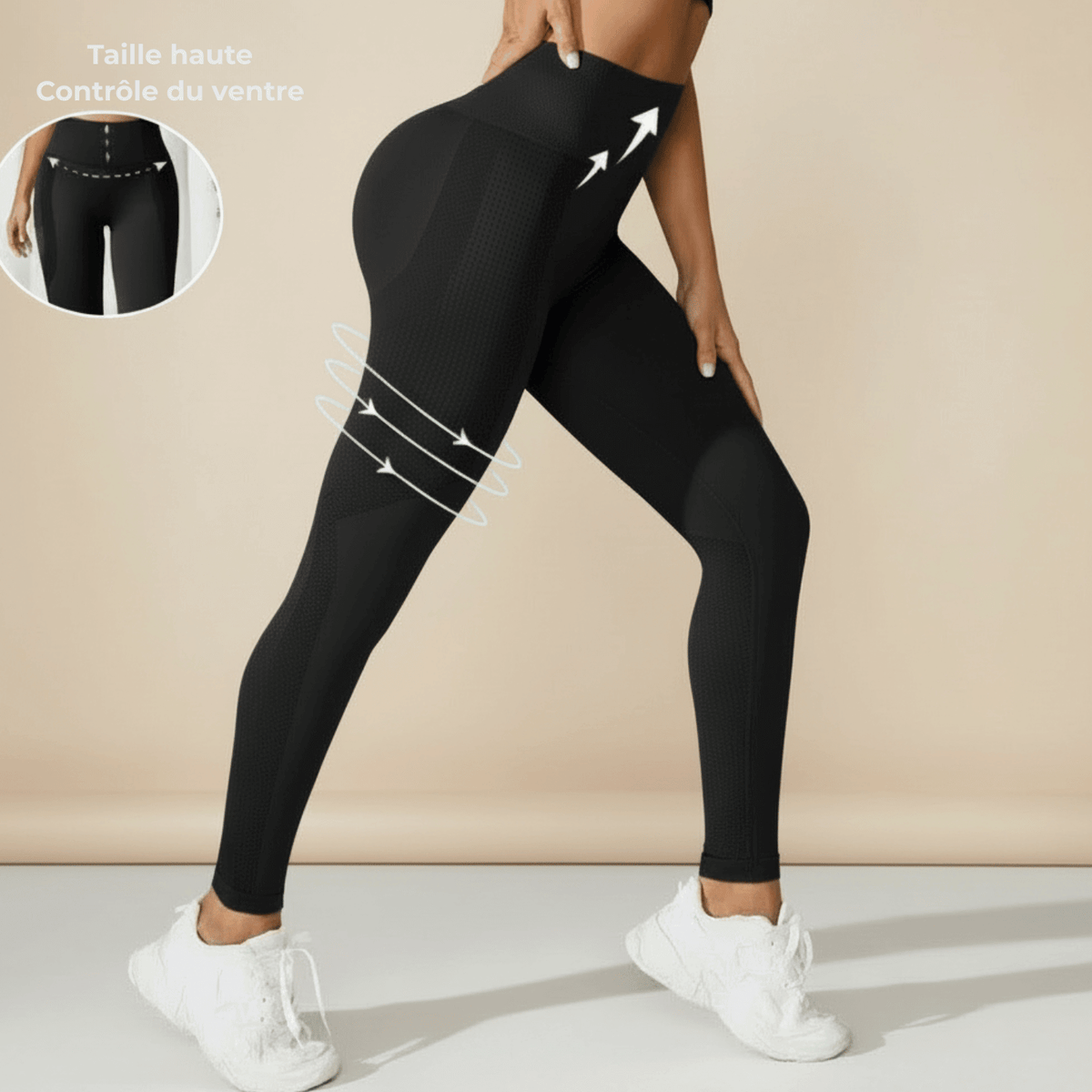 legging anti cellulite photo produit fond crème, legging noir, taille haute contrôle du ventre, flèches blanches