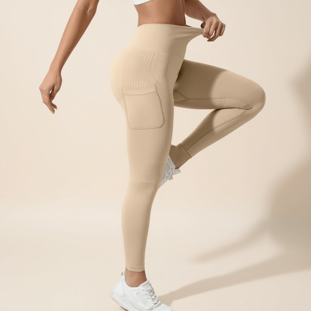Zoom sur la taille haute gainante du legging anti-cellulite avec poches